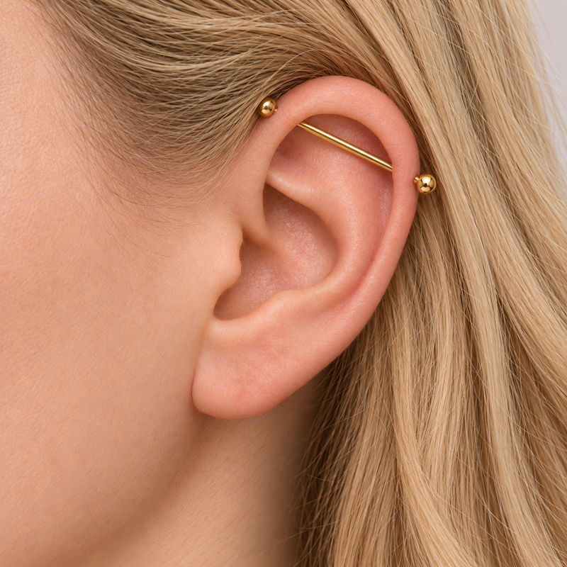 Industrial bar piercing jewelry placement