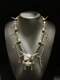 Silver Horned Stitched Doll Face Necklace with Cleaver, Knife & Coffin Charms