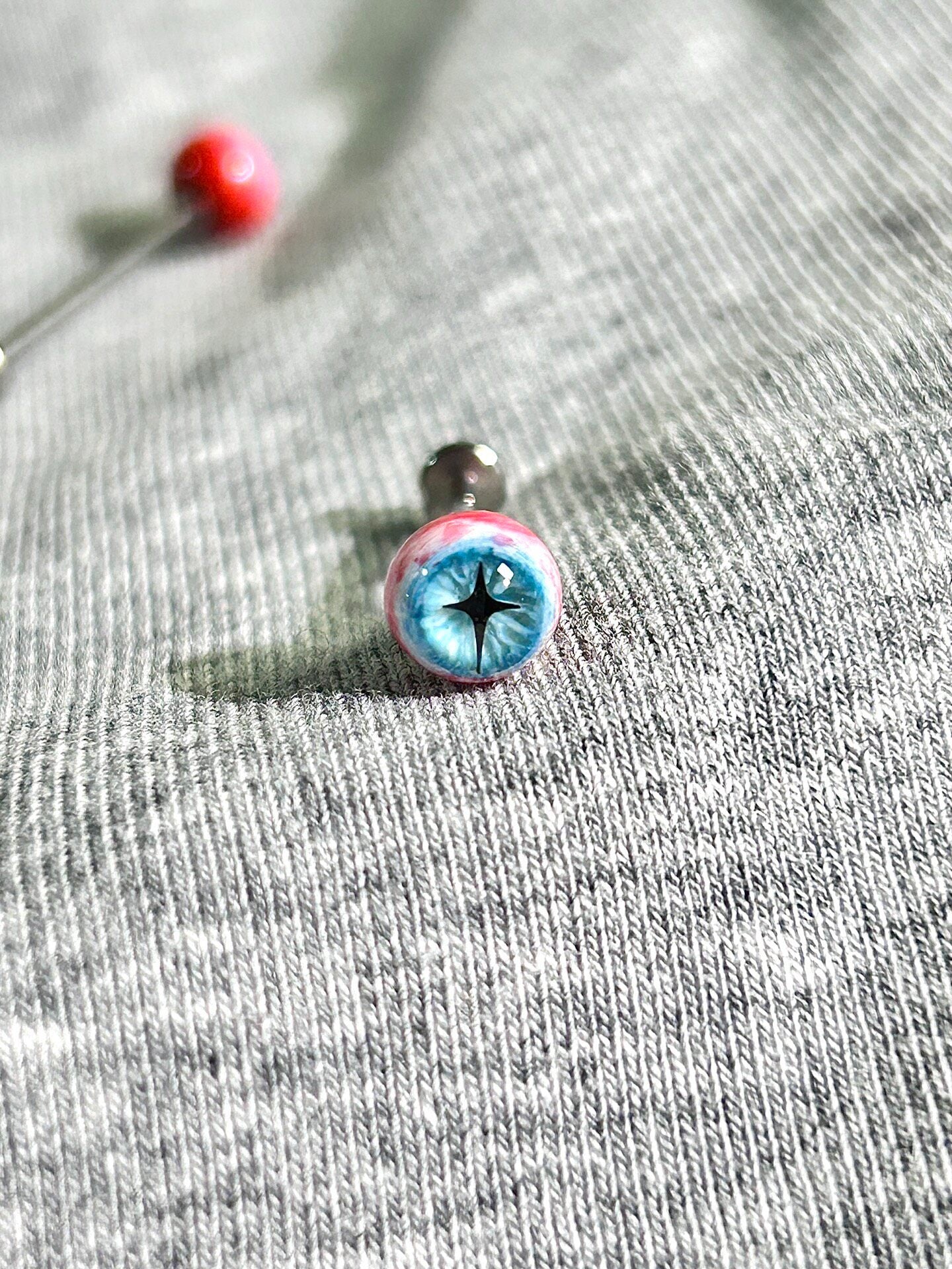 Handcrafted Titanium Star Pupil Eyeball Piercing | Cosmic Cross Eye Stud