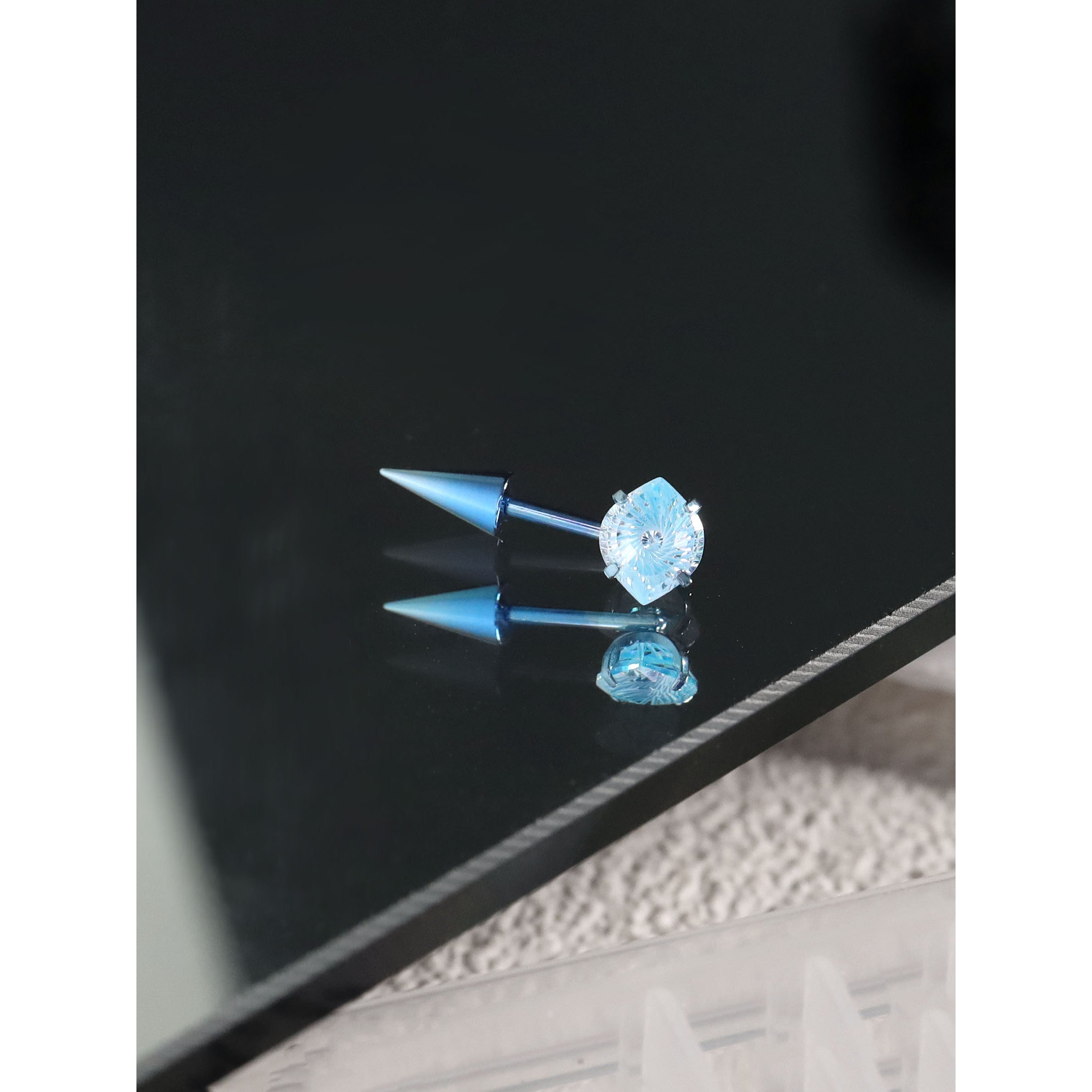 The Glacier Devil's Eye - Titanium Cartilage & Helix Stud