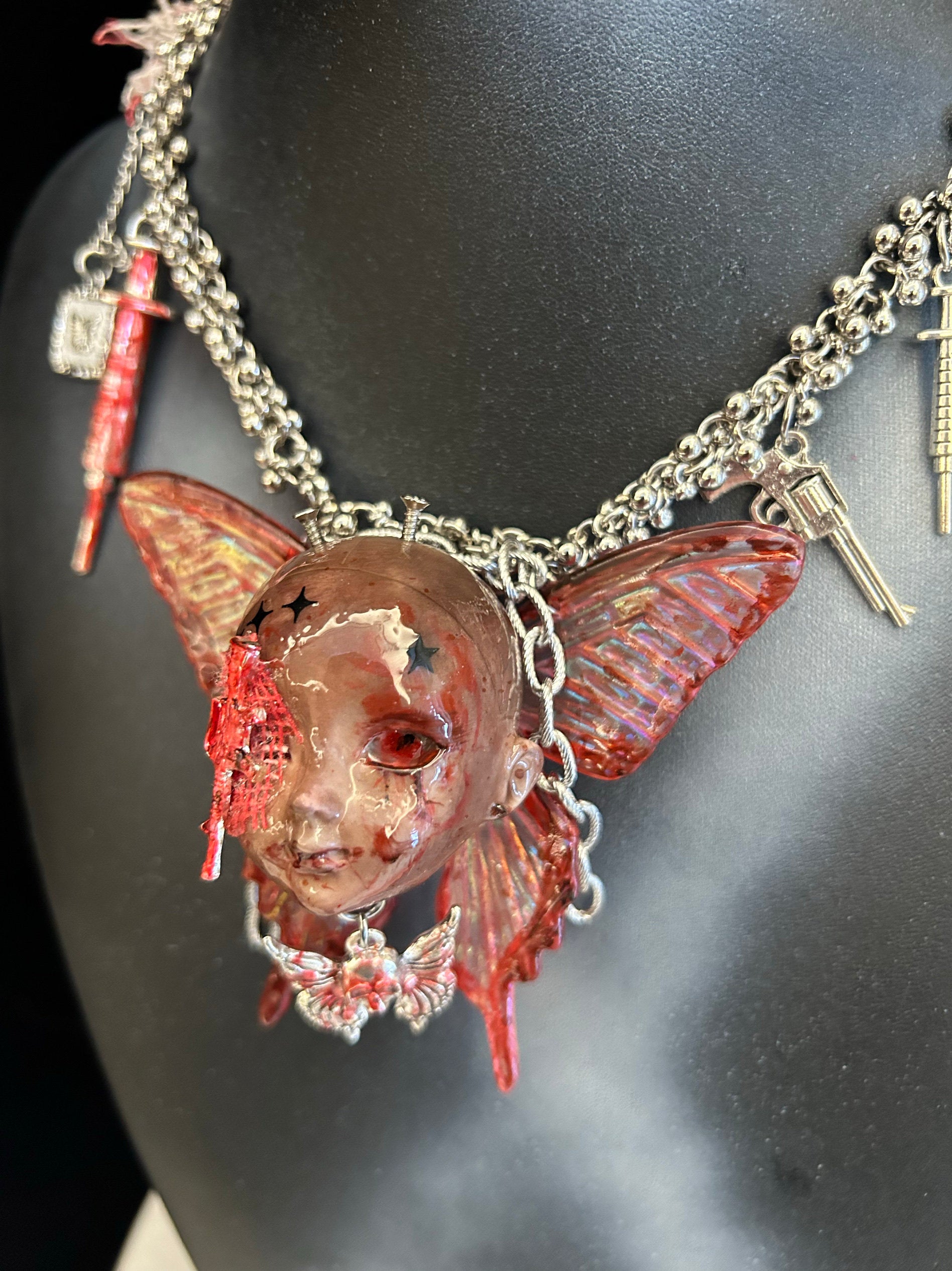 Menhera Bloody Injured Doll Face Necklace with Syringe & Revolver Charms - Red Butterfly Wings