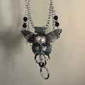 Silver Metallic Butterfly Doll Face Necklace with Rhinestone Heart & Winged Skull Charm