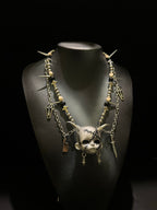 Silver Horned Stitched Doll Face Necklace with Cleaver, Knife & Coffin Charms