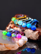 Ohrstecker aus Titan mit Innengewinde und Aurora-Borealis-Opal 