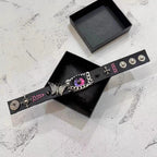 Gothic Black Leather Bracelet with Pink Stitching - Pink Dragon Eye & Silver Moth Cuff - Cross Charm - Pastel Goth Aesthetic