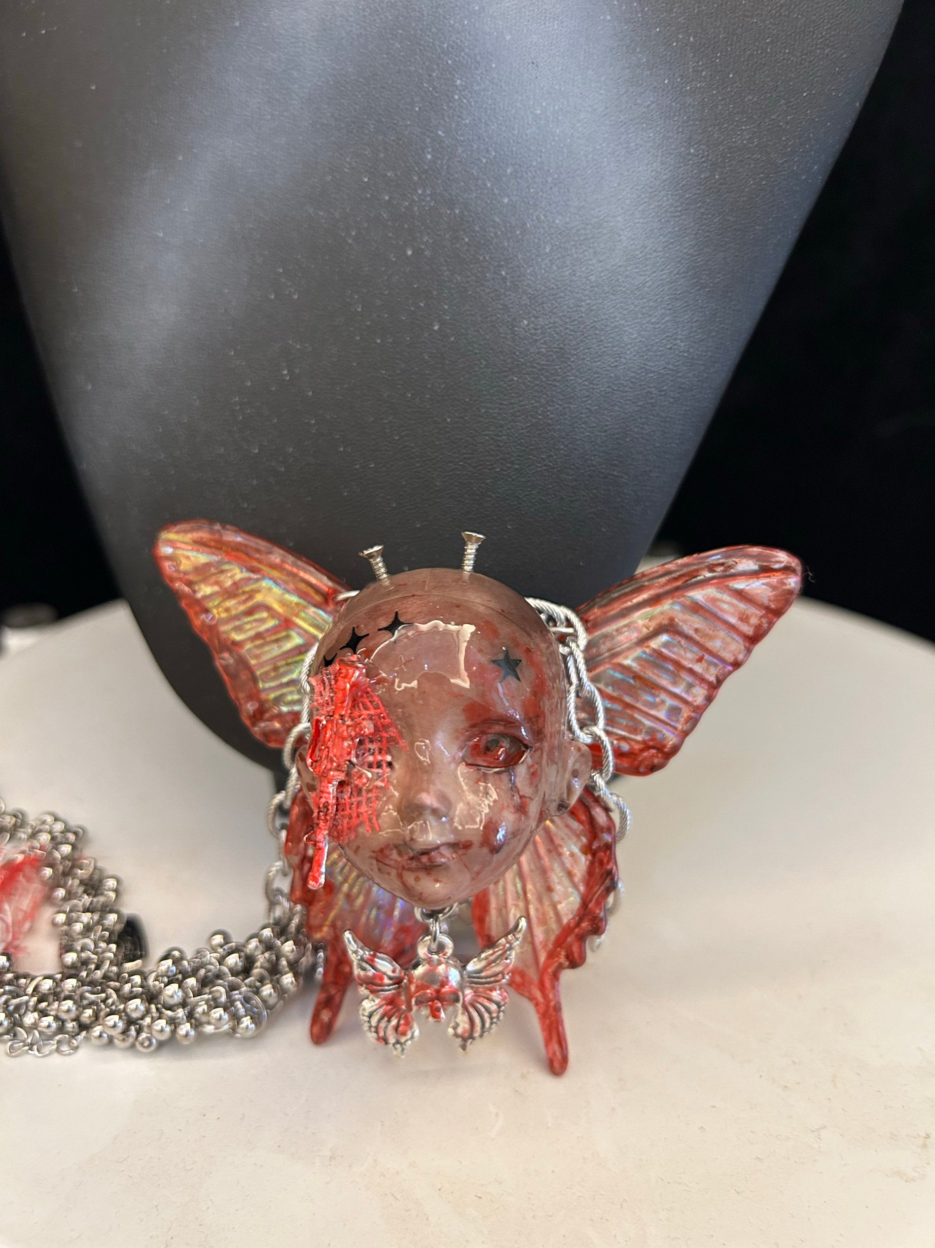 Menhera Bloody Injured Doll Face Necklace with Syringe & Revolver Charms - Red Butterfly Wings