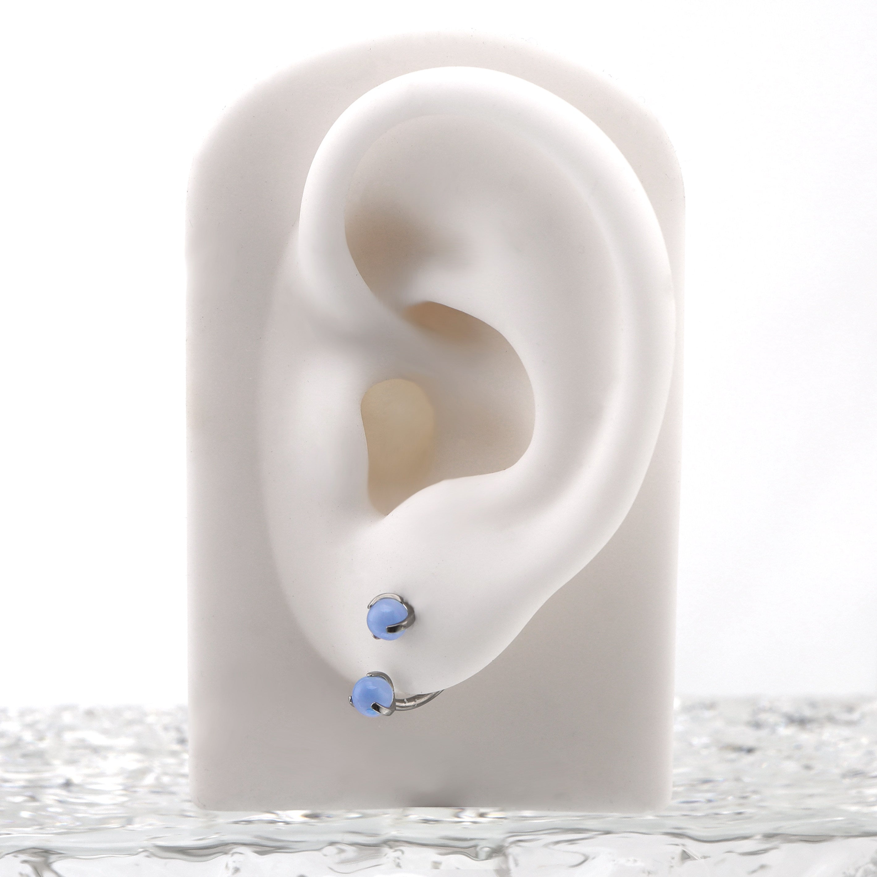 16G Pastellfarbener Zirkonia-Titan-Hufeisenring 