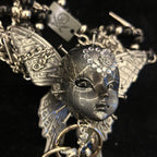 Silver Metallic Butterfly Doll Face Necklace with Rhinestone Heart & Winged Skull Charm