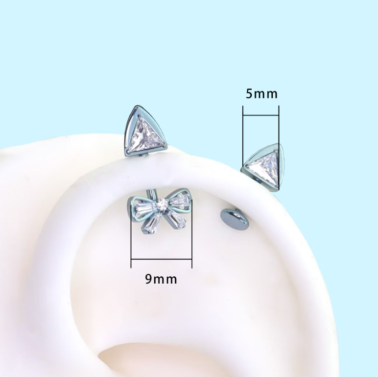 Carousel Boutique Crystal Bow & Triangle CZ Piercing Set |Rainbow Dash Titanium Rook & Labret Earrings