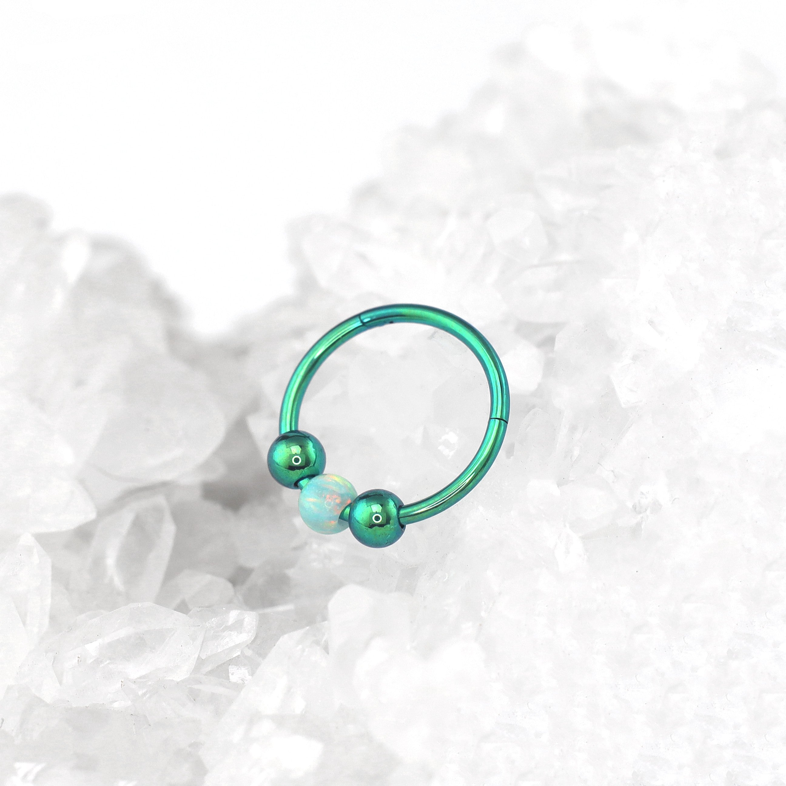 Spinning Ball Opal Titanium Segment Hoop - Spinning Ball Opal Titanium Segment Hoop - Maldives Green by CRUXJEWELRY