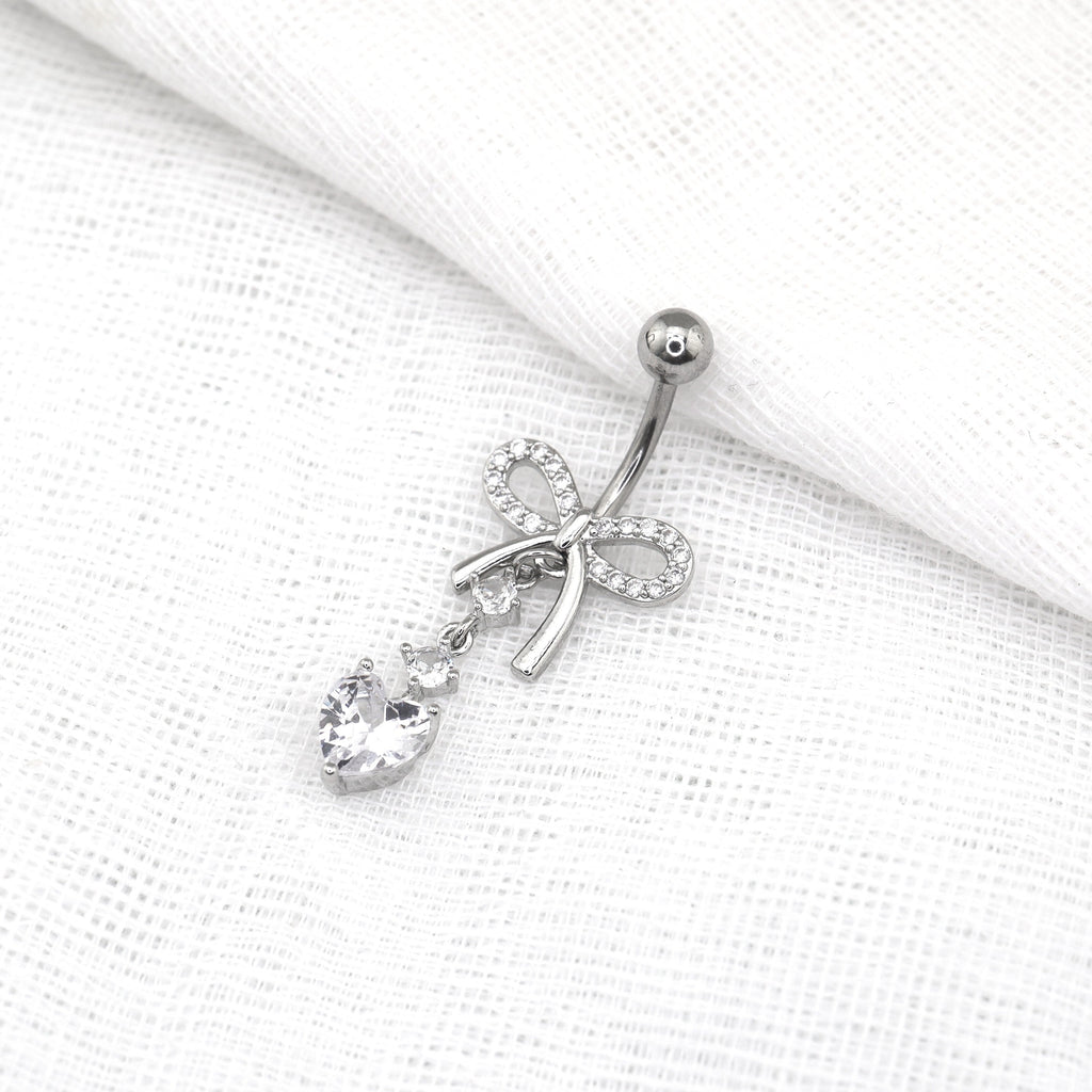 Heart-shaped CZ bow tie Dangle Belly Ring - Heart-shaped CZ bow tie Dangle Belly Ring - radiant-white by CRUXJEWELRY