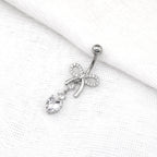 Heart-shaped CZ bow tie Dangle Belly Ring - Heart-shaped CZ bow tie Dangle Belly Ring - radiant-white by CRUXJEWELRY