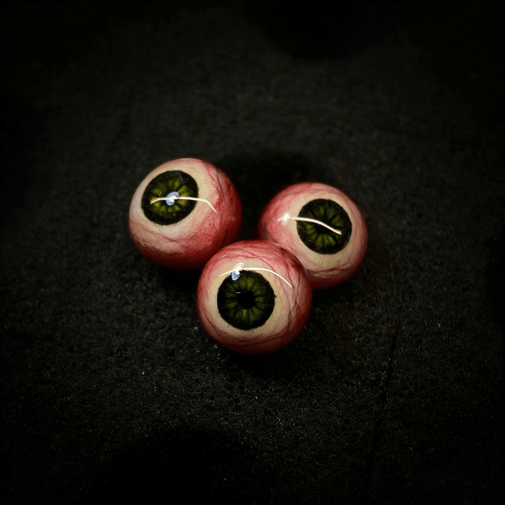 Cthulhu-Auge – Blau-grüner Blick | Ohr-/Lippen-/Zungenpiercings 