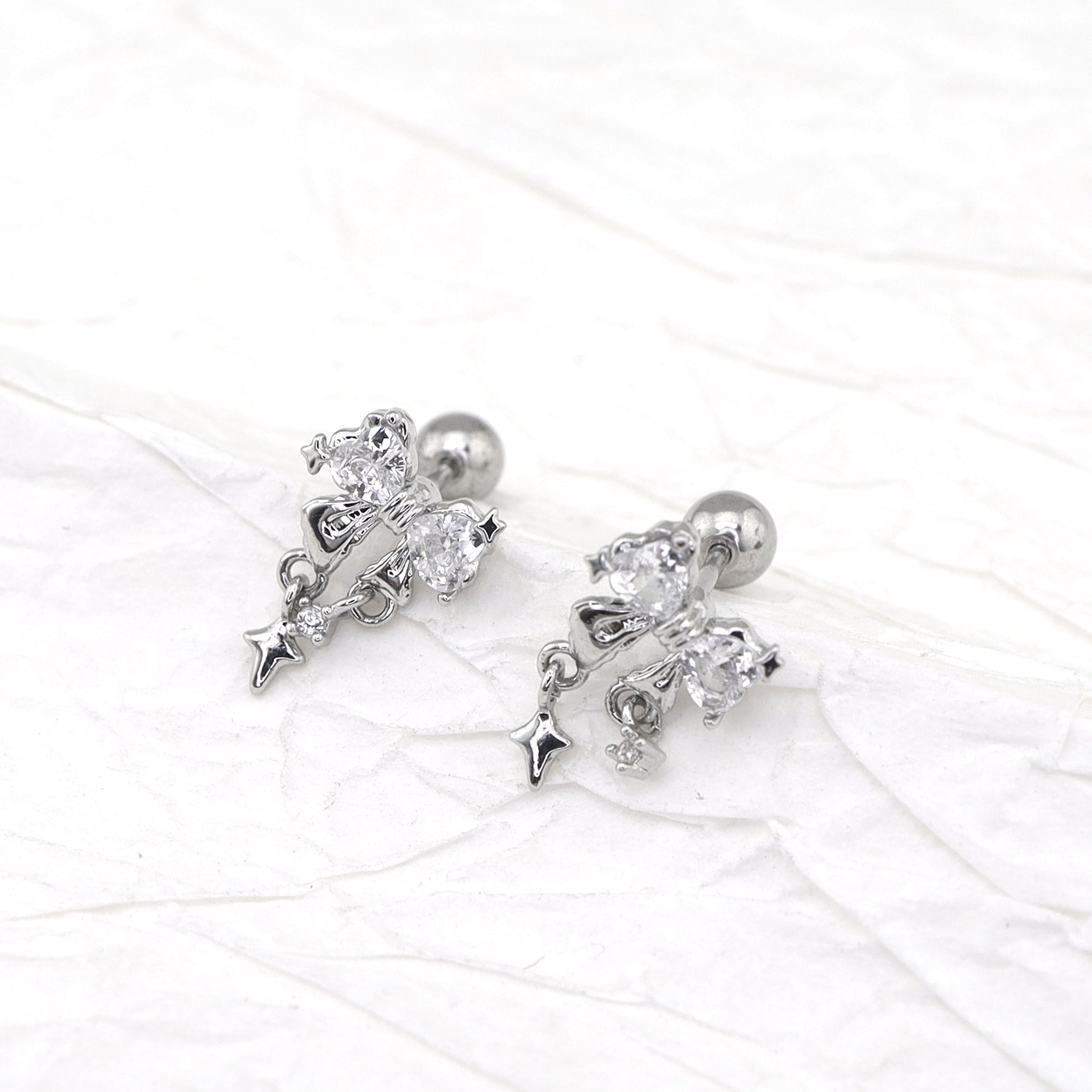 20G Thin Bow Dangle Ear Studs - 20G Thin Bow Dangle Ear Studs - Single by CRUXJEWELRY