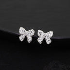 Full CZ Bow Tie Ear Stud - Full CZ Bow Tie Ear Stud - White / Single by CRUXJEWELRY