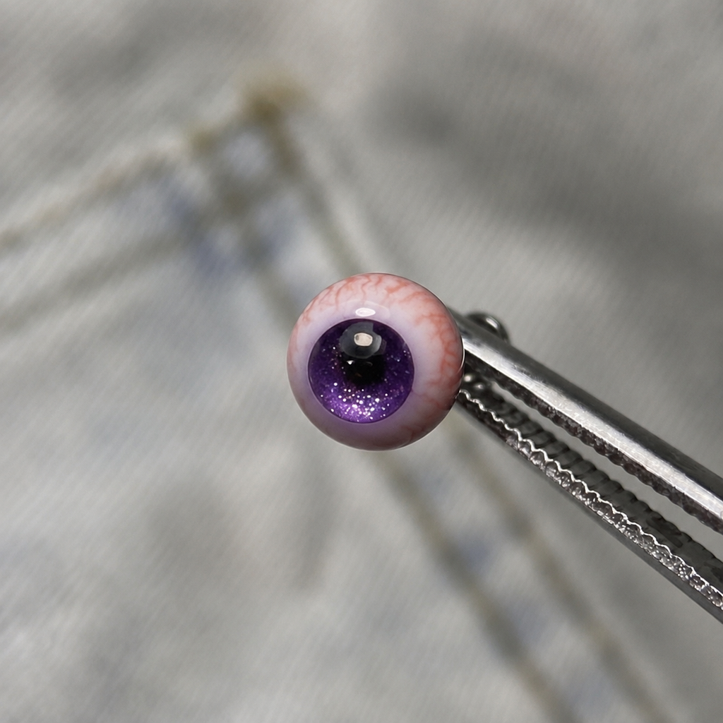 Cthulhu-Auge – Blau-grüner Blick | Ohr-/Lippen-/Zungenpiercings 