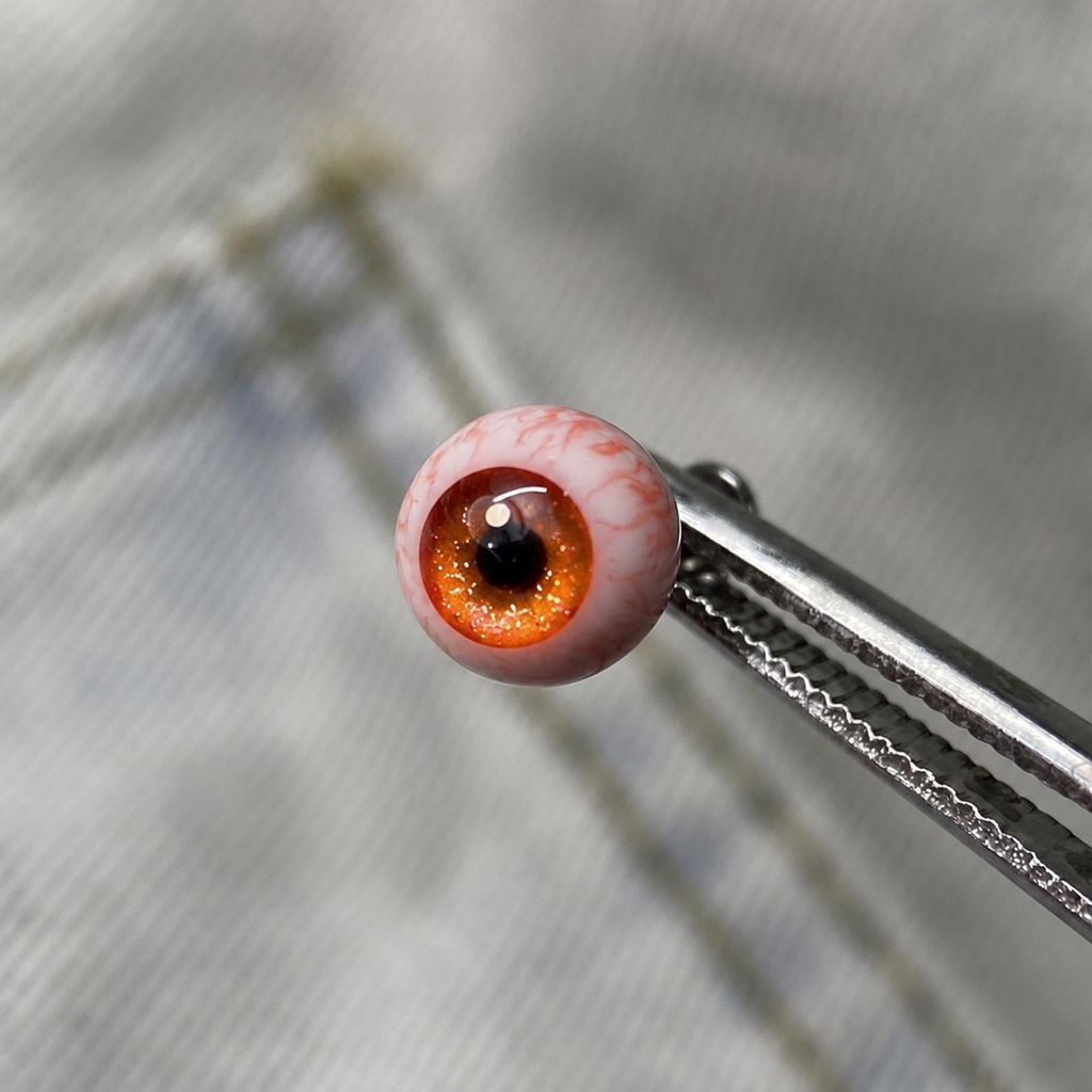 Cthulhu-Auge – Blau-grüner Blick | Ohr-/Lippen-/Zungenpiercings 