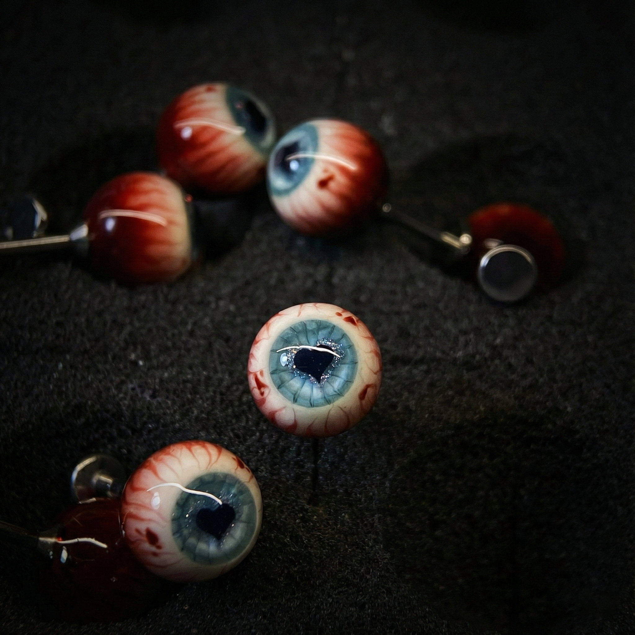 Œil de Cthulhu - Regard bleu et vert | Piercings oreilles/lèvres/langue 