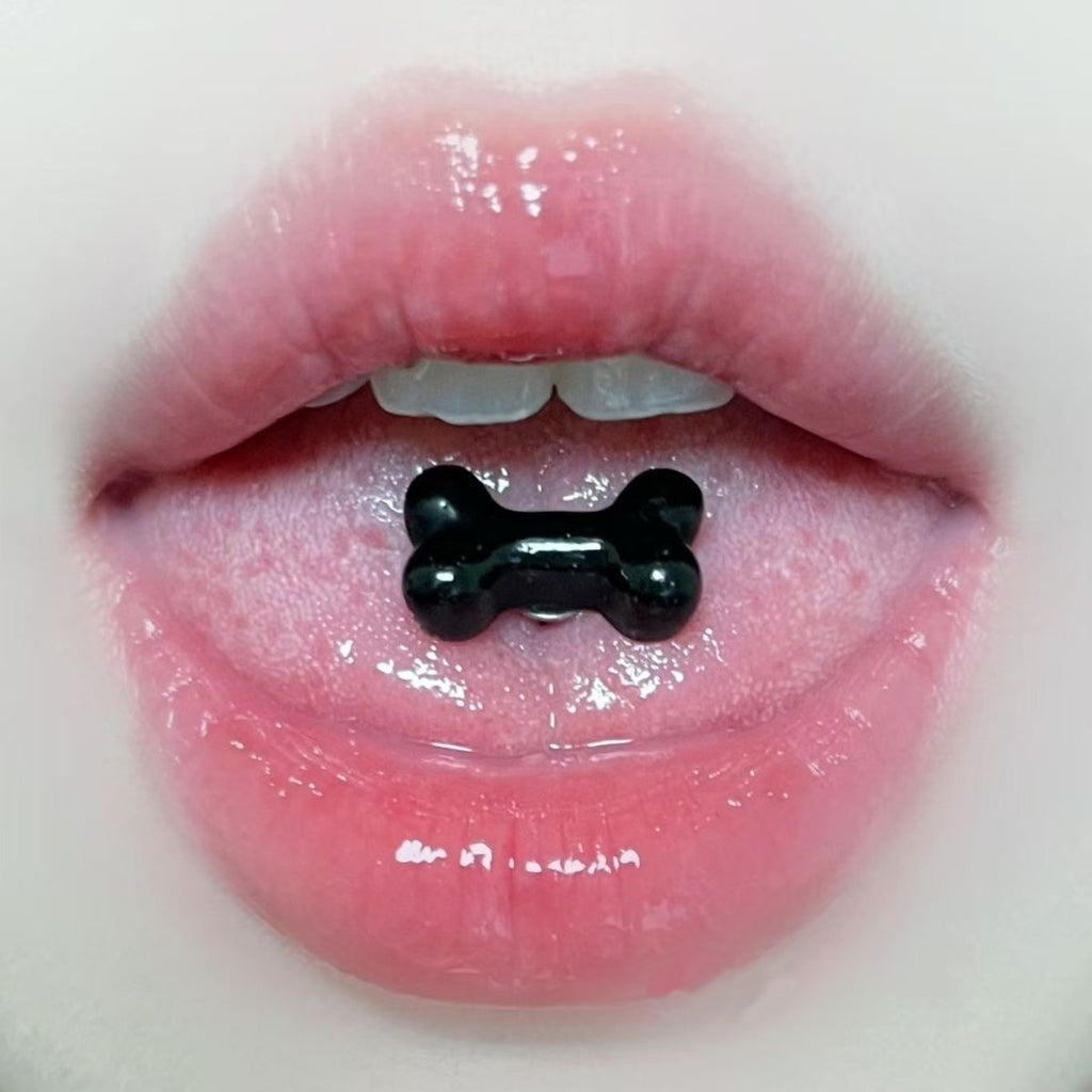 piercing de langue en résine, os blanc et acier inoxydable 
