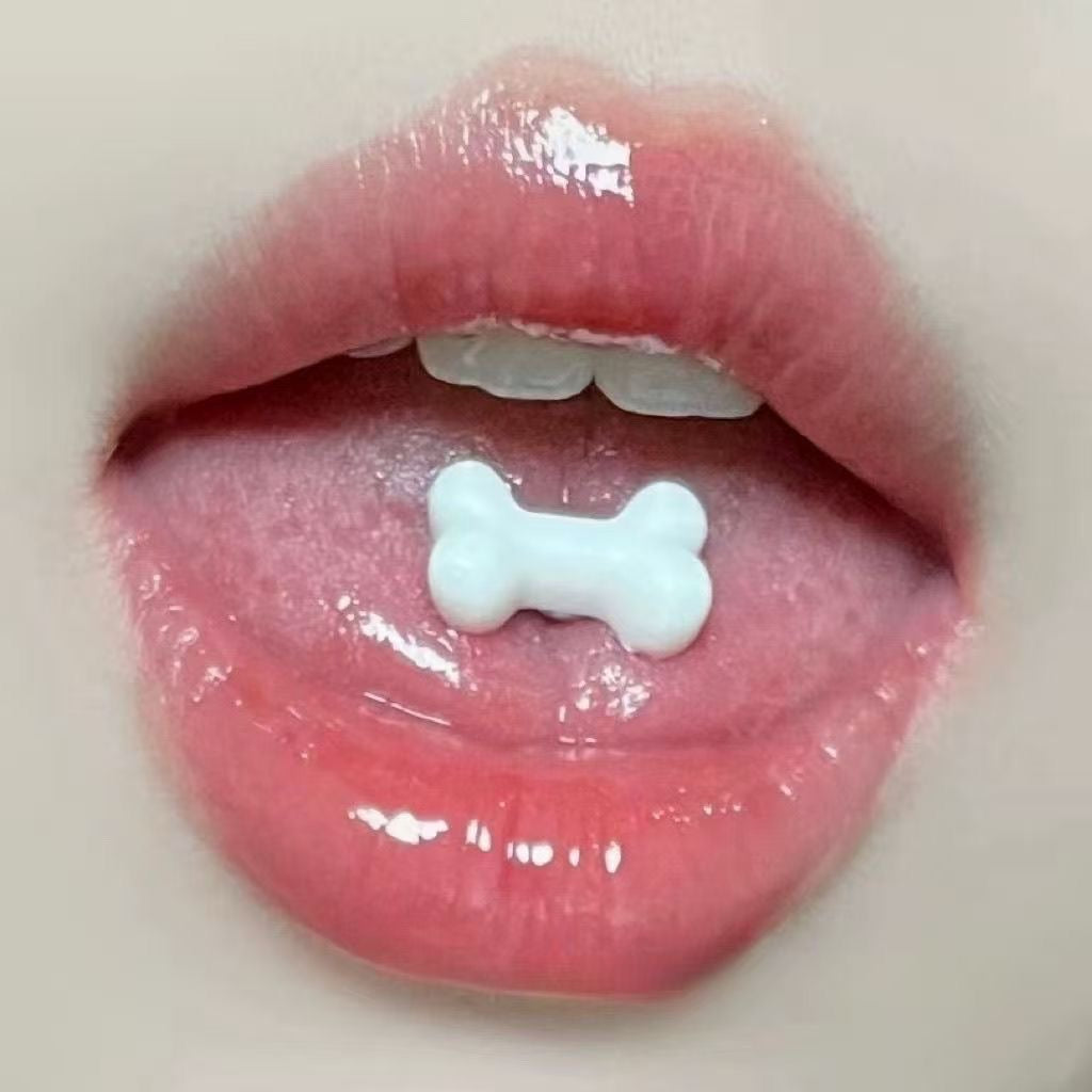 piercing de langue en résine, os blanc et acier inoxydable 