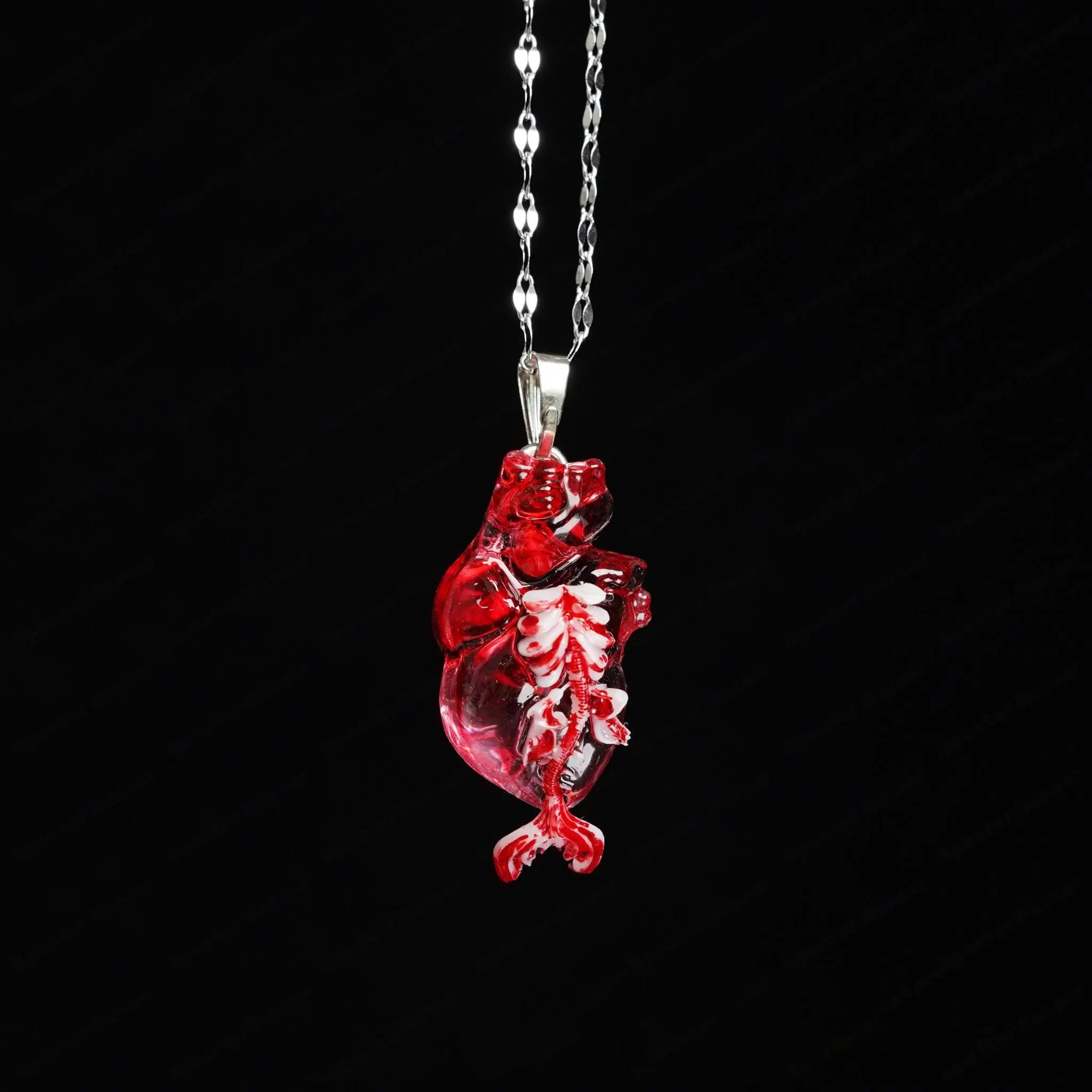"The Little Mermaid" Fossilized Heart Necklace - Skeleton Tail Detail