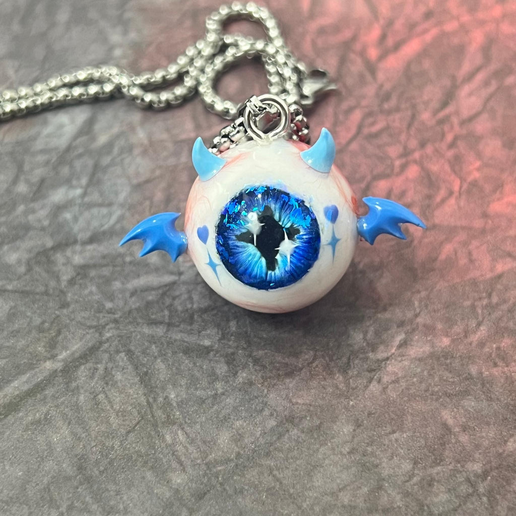 "The Crux" Blue Demon Eye Necklace - Signature Cross Pupil