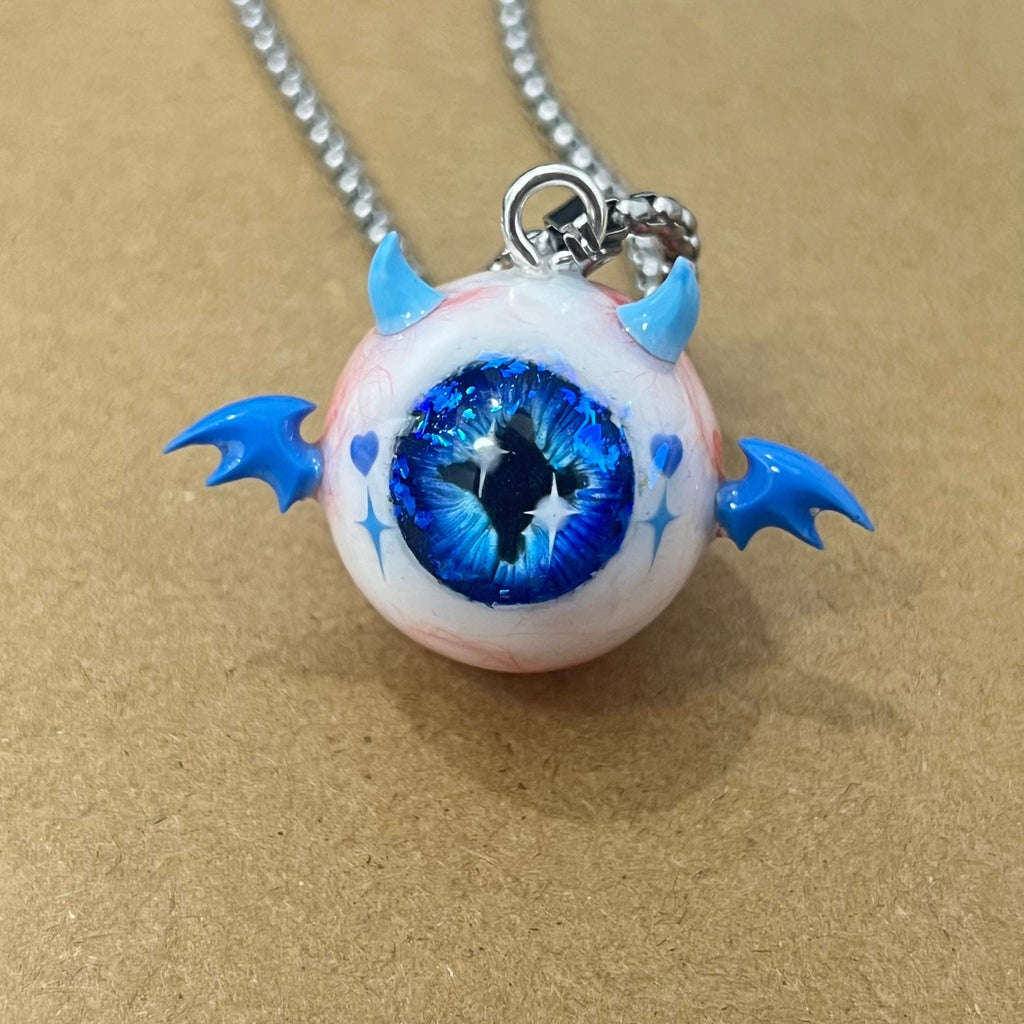 "The Crux" Blue Demon Eye Necklace - Signature Cross Pupil