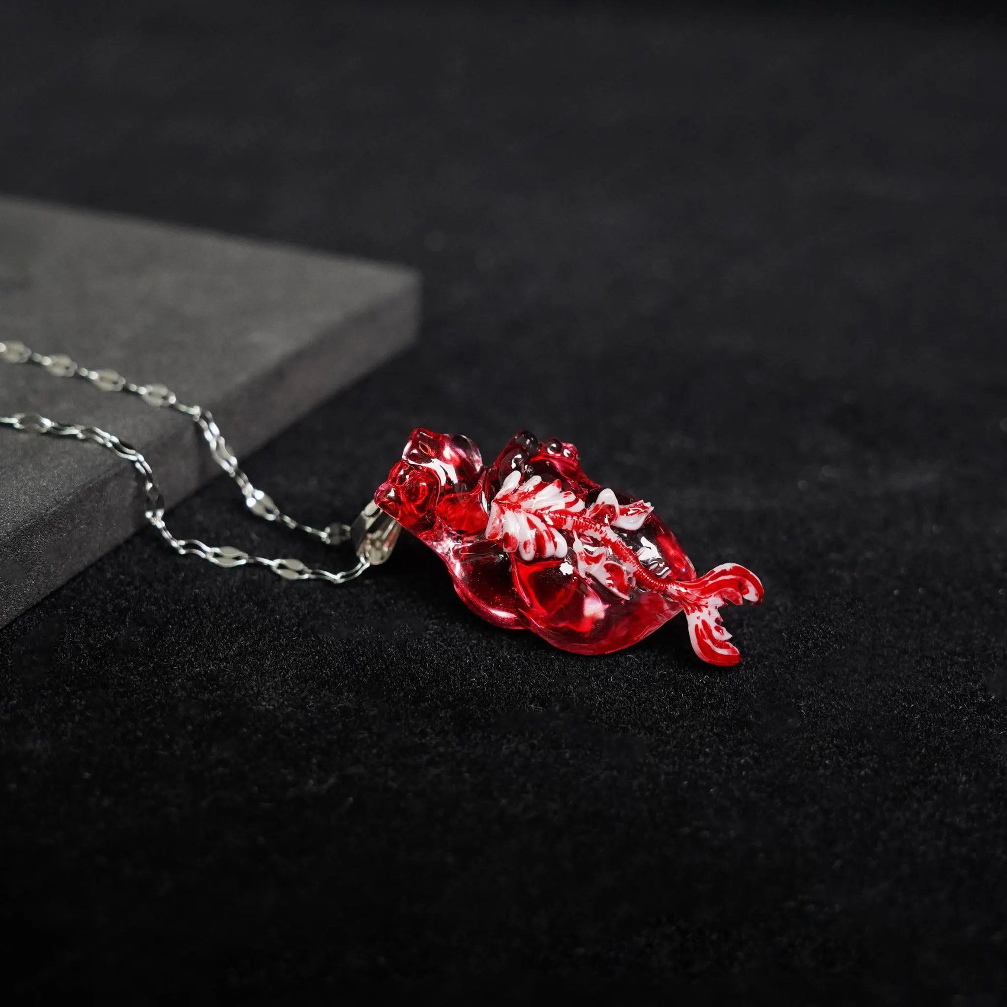 "The Little Mermaid" Fossilized Heart Necklace - Skeleton Tail Detail