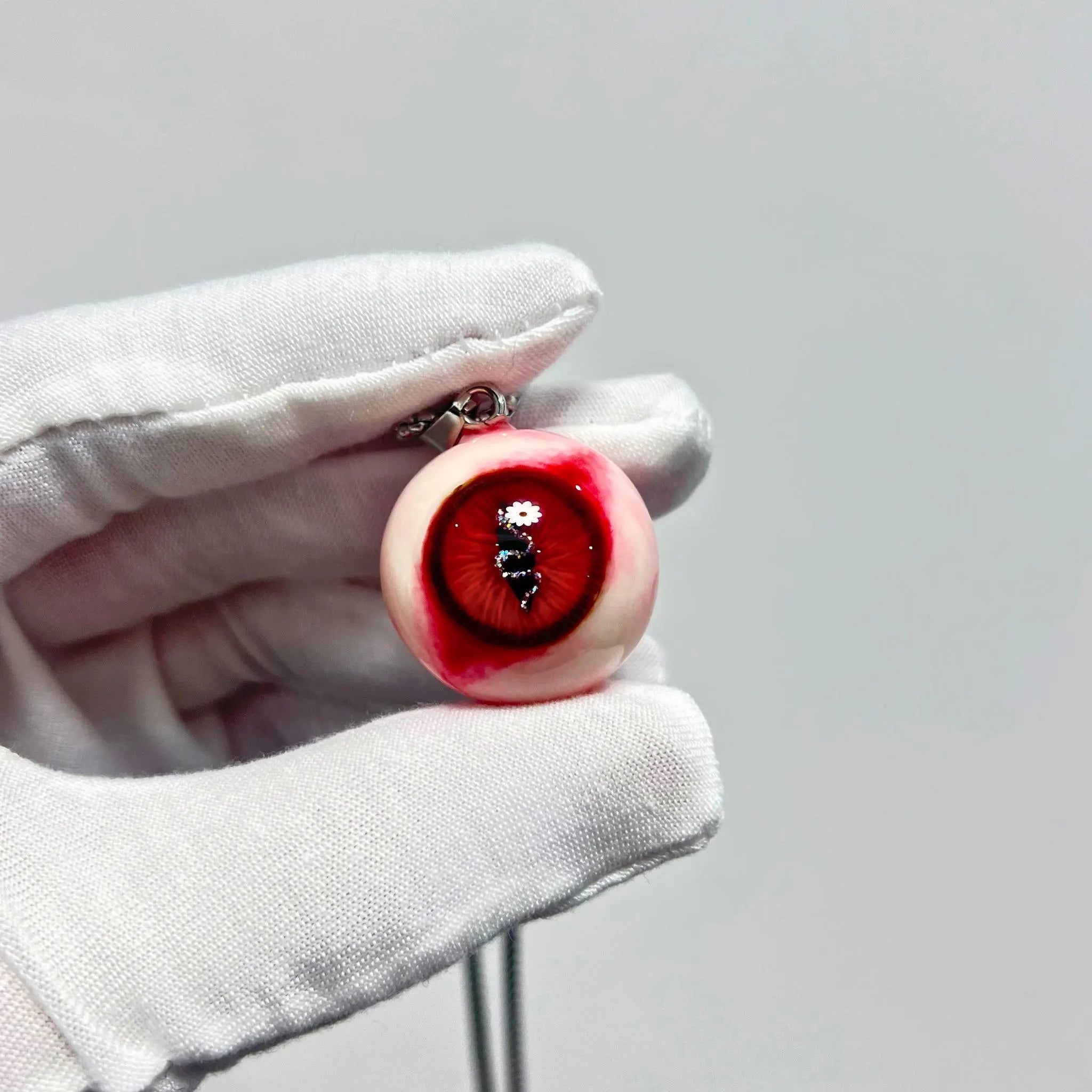 "Forbidden Fruit" Red Snake Eye Necklace - Wavy Pupil & Daisy Detail