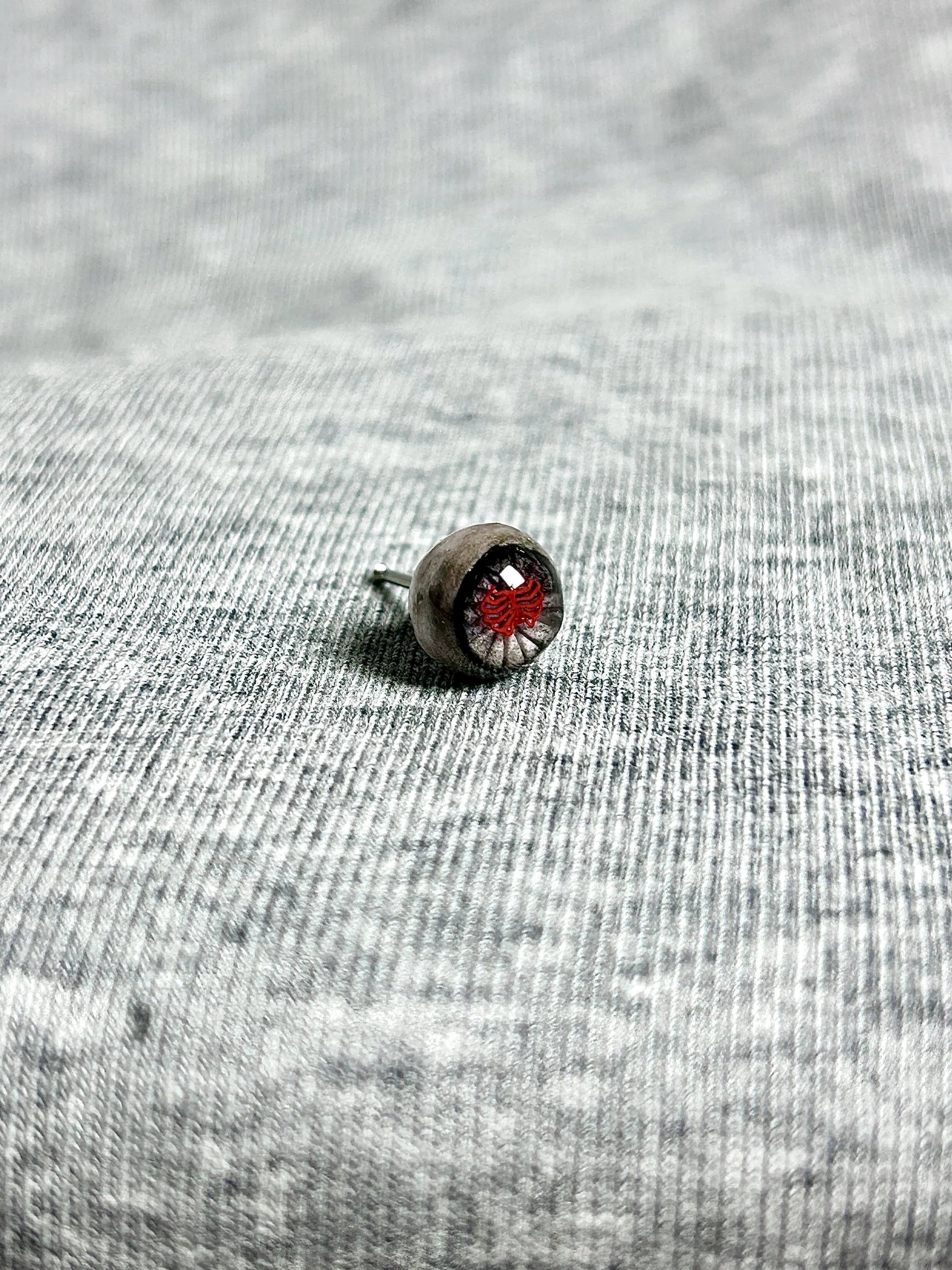 "Bloody Ribs" Dark Eyeball Studs - Red Skeleton Pupil