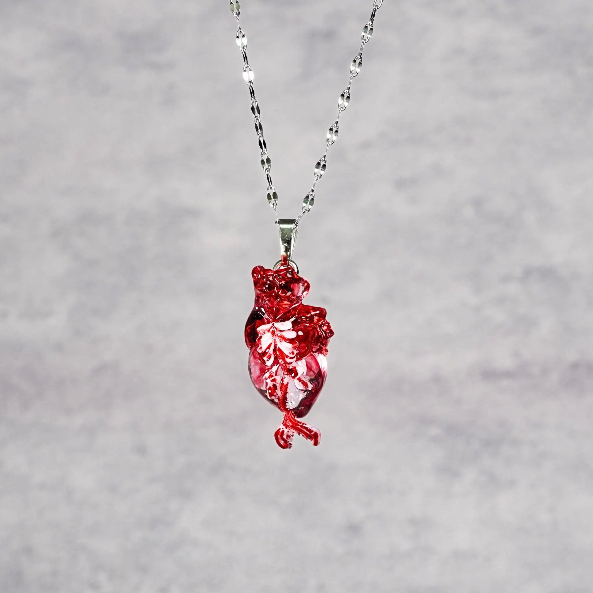 "The Little Mermaid" Fossilized Heart Necklace - Skeleton Tail Detail