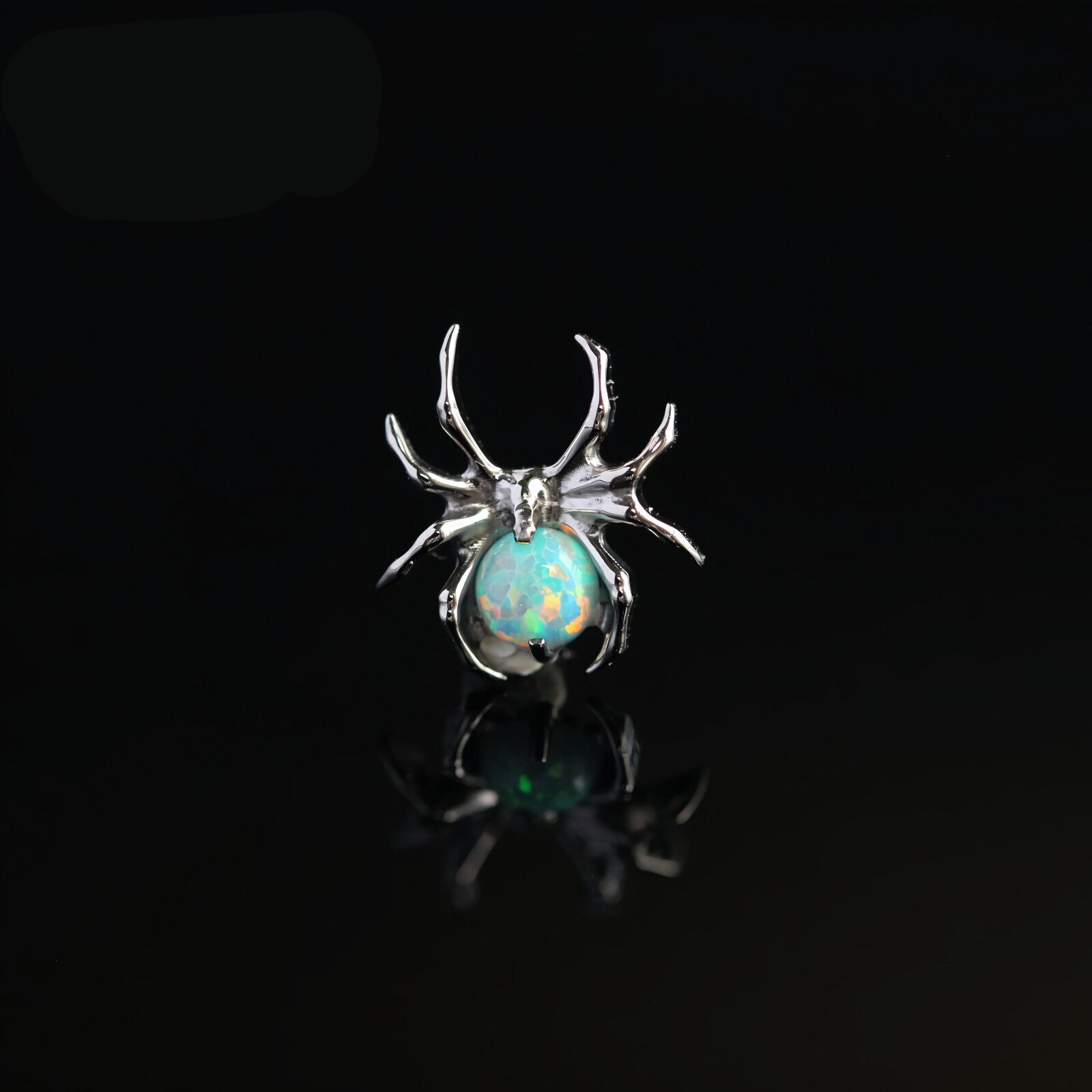 Boucles d'oreilles en titane et cristal araignée 