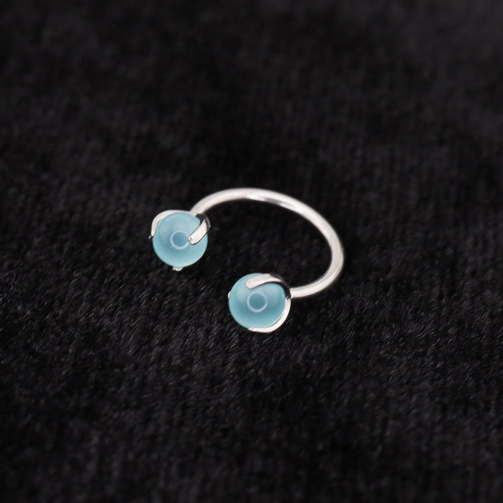 16G Pastellfarbener Zirkonia-Titan-Hufeisenring 