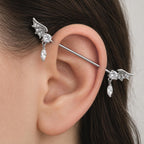 Bat Wing Crystal titanium industrial barbell, detail view 2