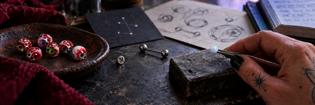 CRUX jewelry design and stone-setting process at a workbench