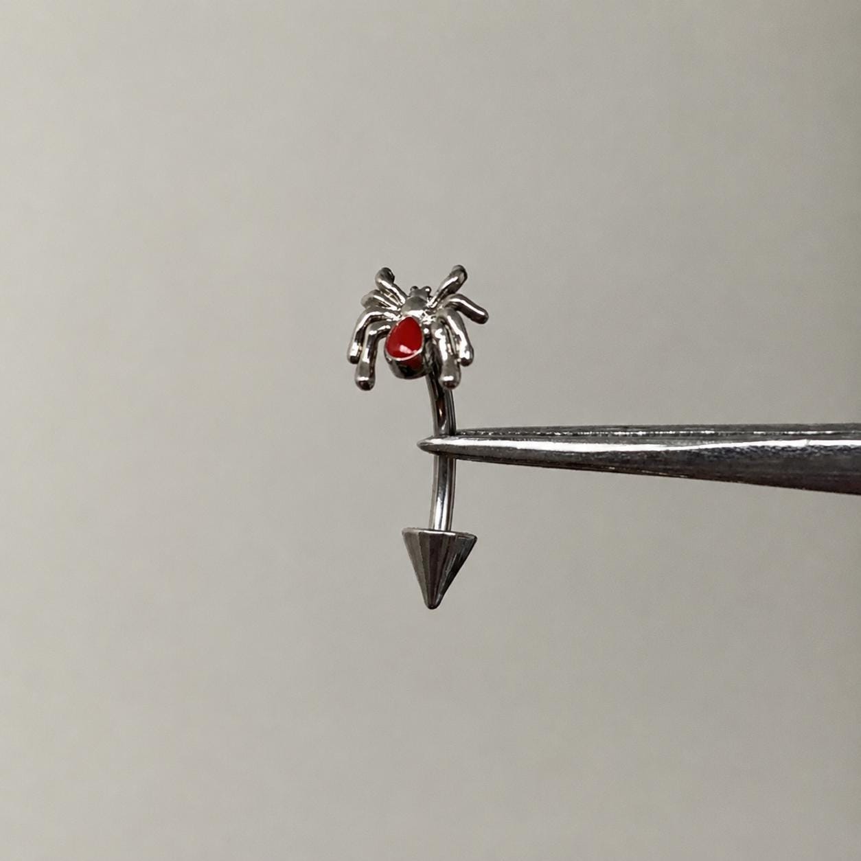 Red Gem Spider Titanium Eyebrow Barbell detail 2