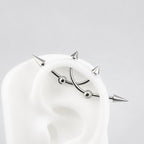 Double Spike titanium industrial barbell, detail view 8