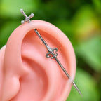 Fleur-de-Lis Sword titanium industrial barbell, detail view 4