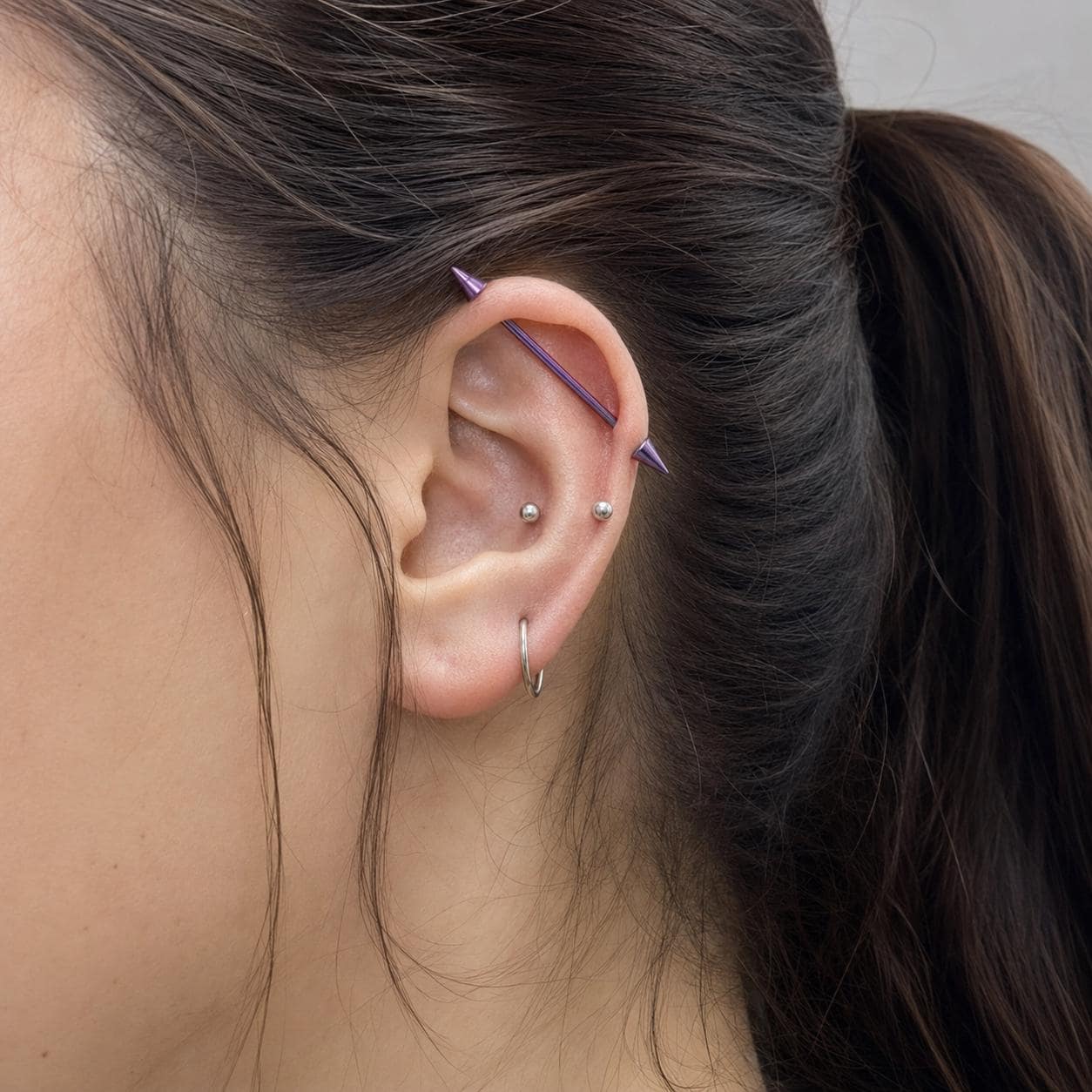 Gradient Ball & Spike titanium industrial barbell, detail view 3
