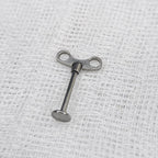 Wind-Up Doll Key Flatback Labret detail 4
