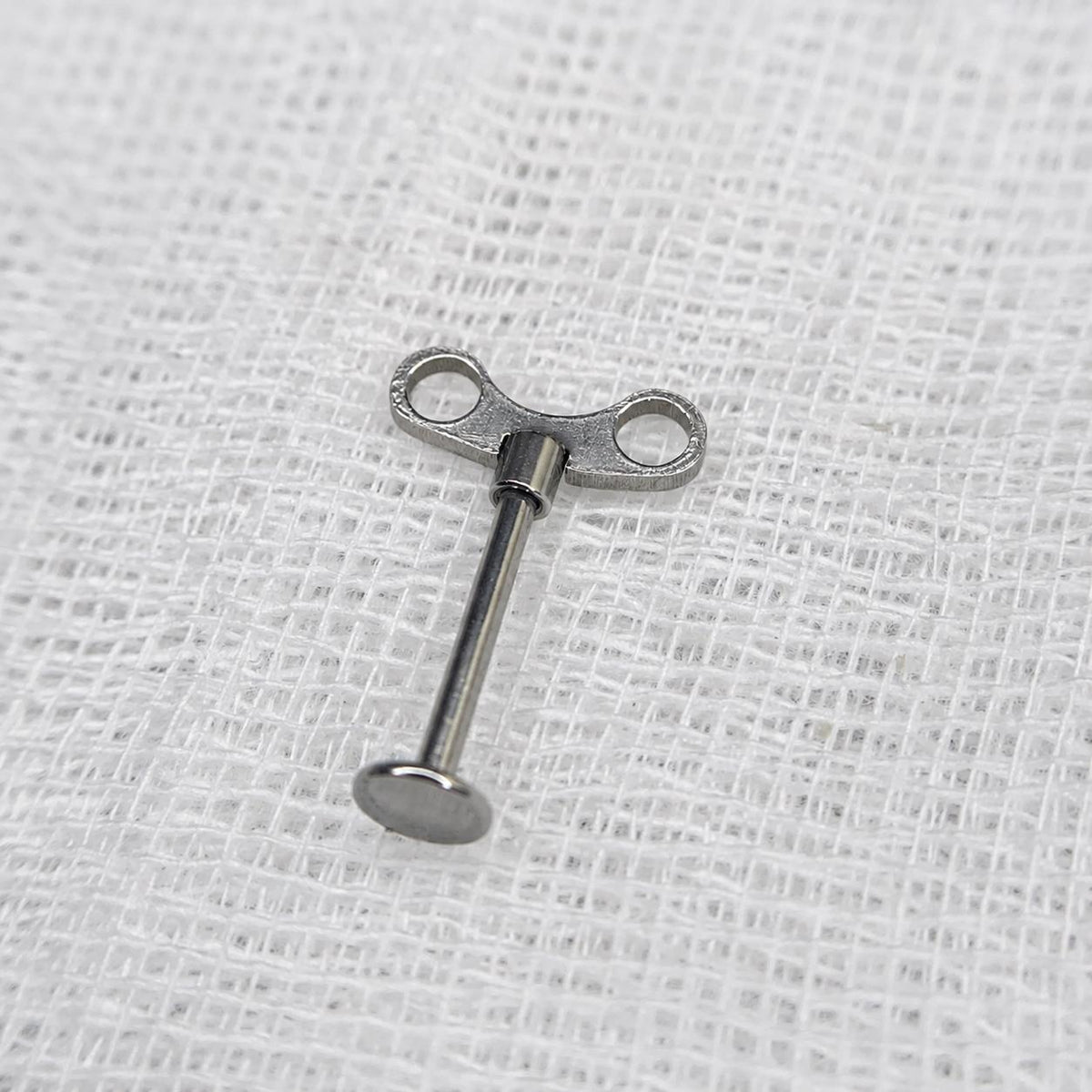 Wind-Up Doll Key Flatback Labret detail 4