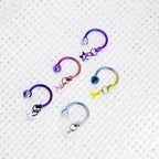 Celestial Dangle Star Titanium Horseshoe Ring detail 3