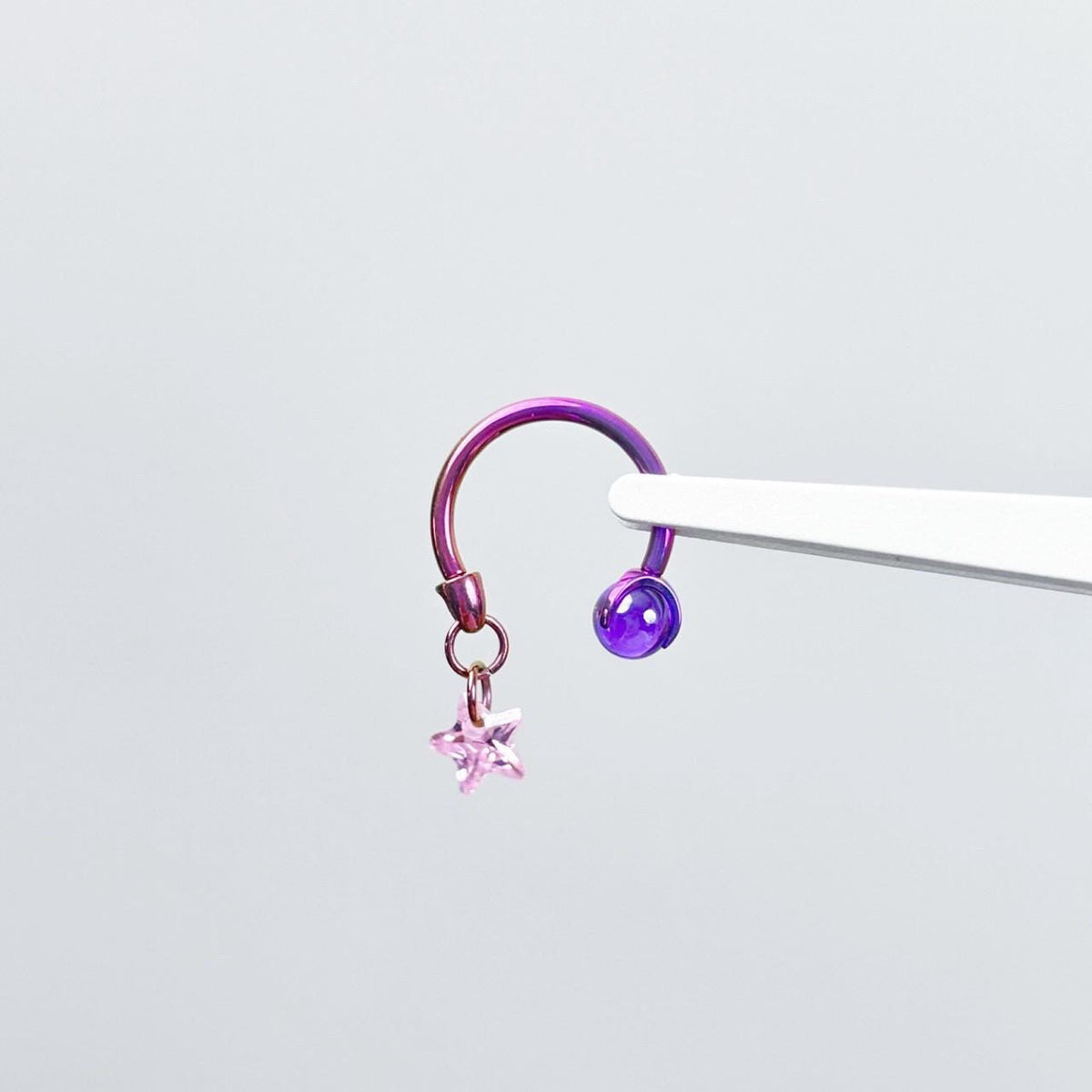 Celestial Dangle Star Titanium Horseshoe Ring detail 7