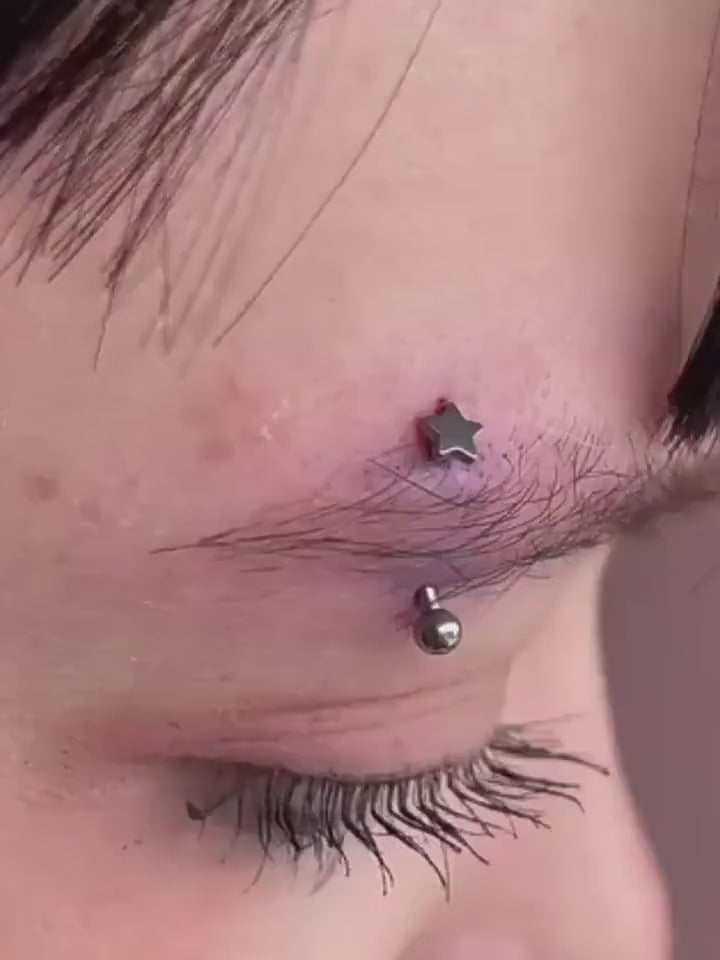Silver Star Titanium Eyebrow Barbell video