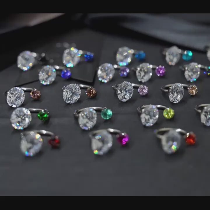 Bague en titane à fer à cheval asymétrique en zircon cubique brillant 